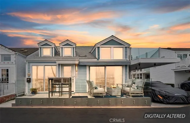 a view of a brick house with many windows