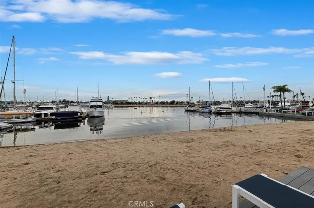 a view of swimming pool with outdoor seating and city view