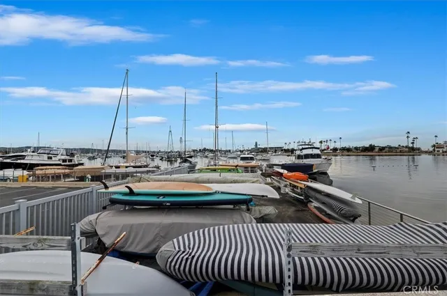 a view of a swimming pool with a table and chairs