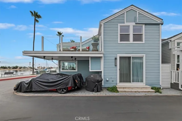 a view of a car park in front of house