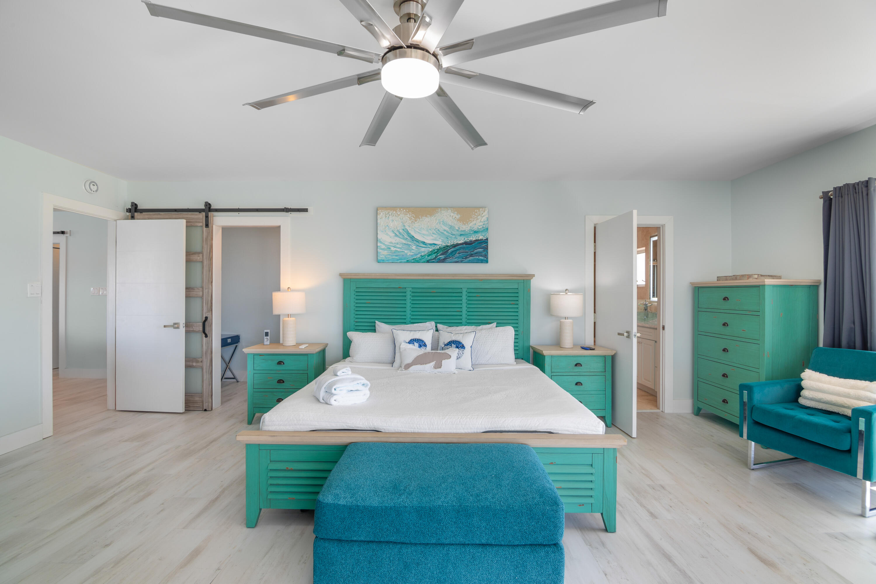 781 9th Street Key Colony Beach, FL 33051 - Photo 28 of 95 a bedroom with a bed mirror and a large window