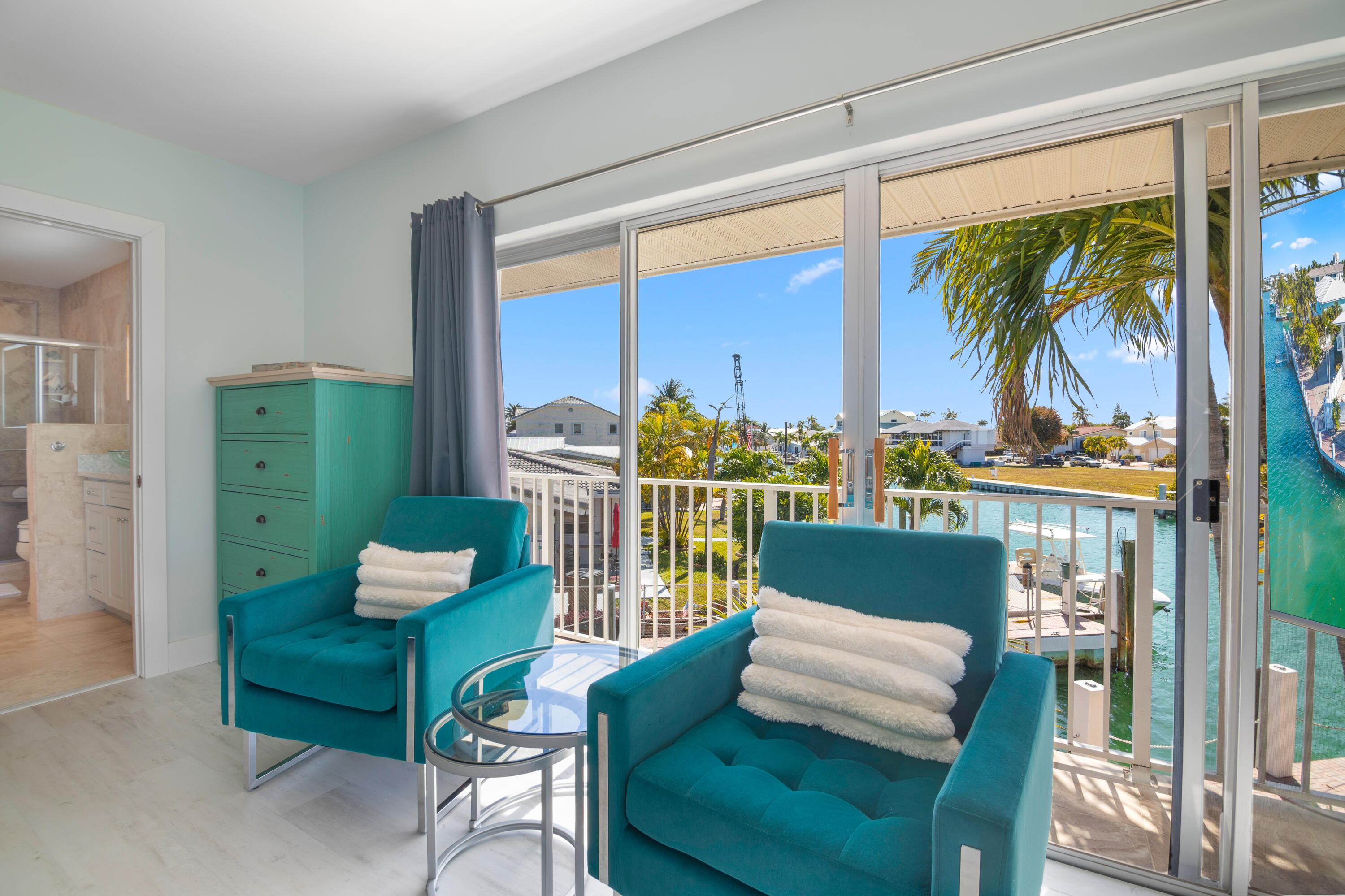 781 9th Street Key Colony Beach, FL 33051 - Photo 29 of 95 a living room with furniture and a potted plant