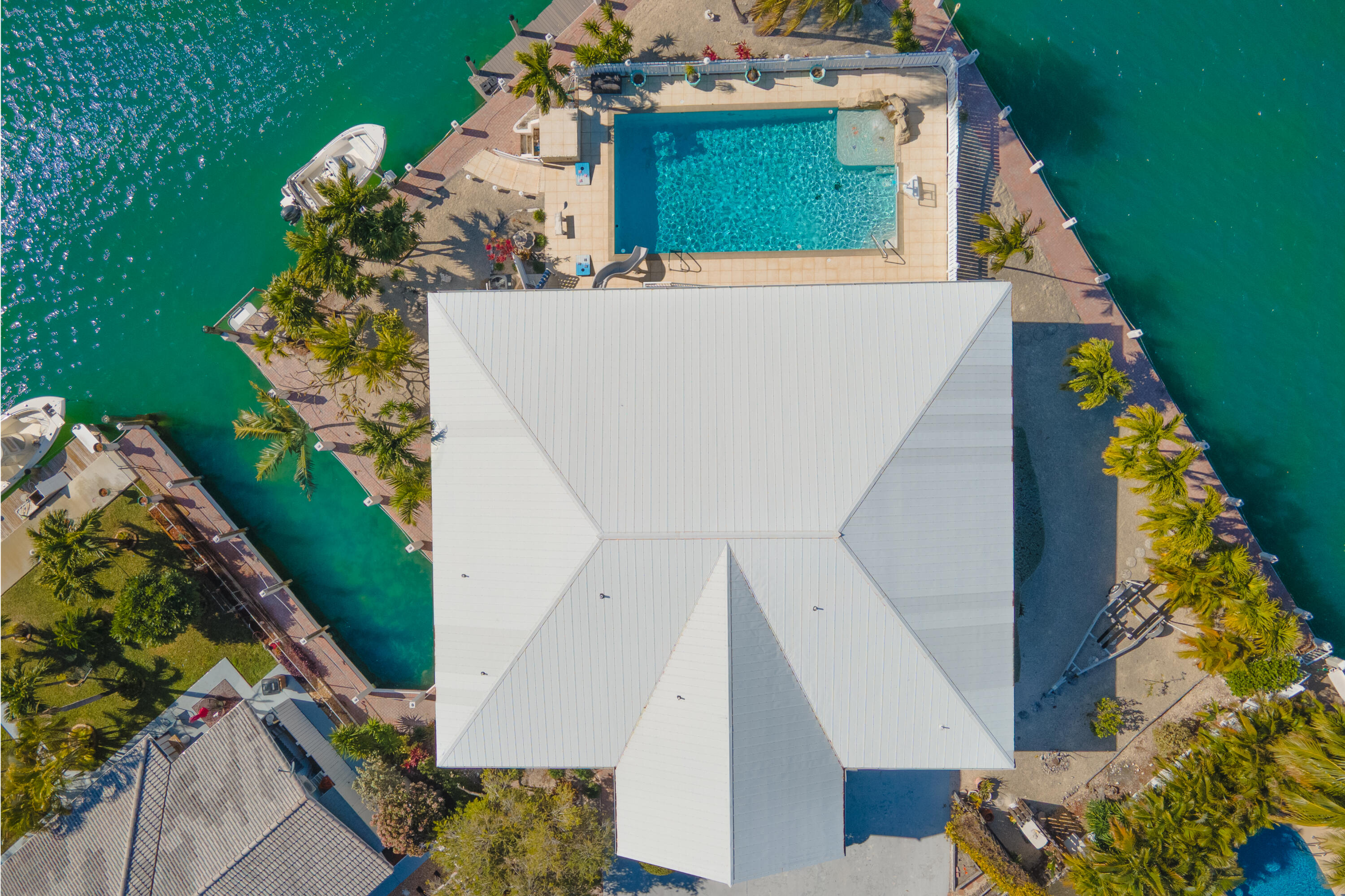 781 9th Street Key Colony Beach, FL 33051 - Photo 3 of 95 a view of a house with a small yard
