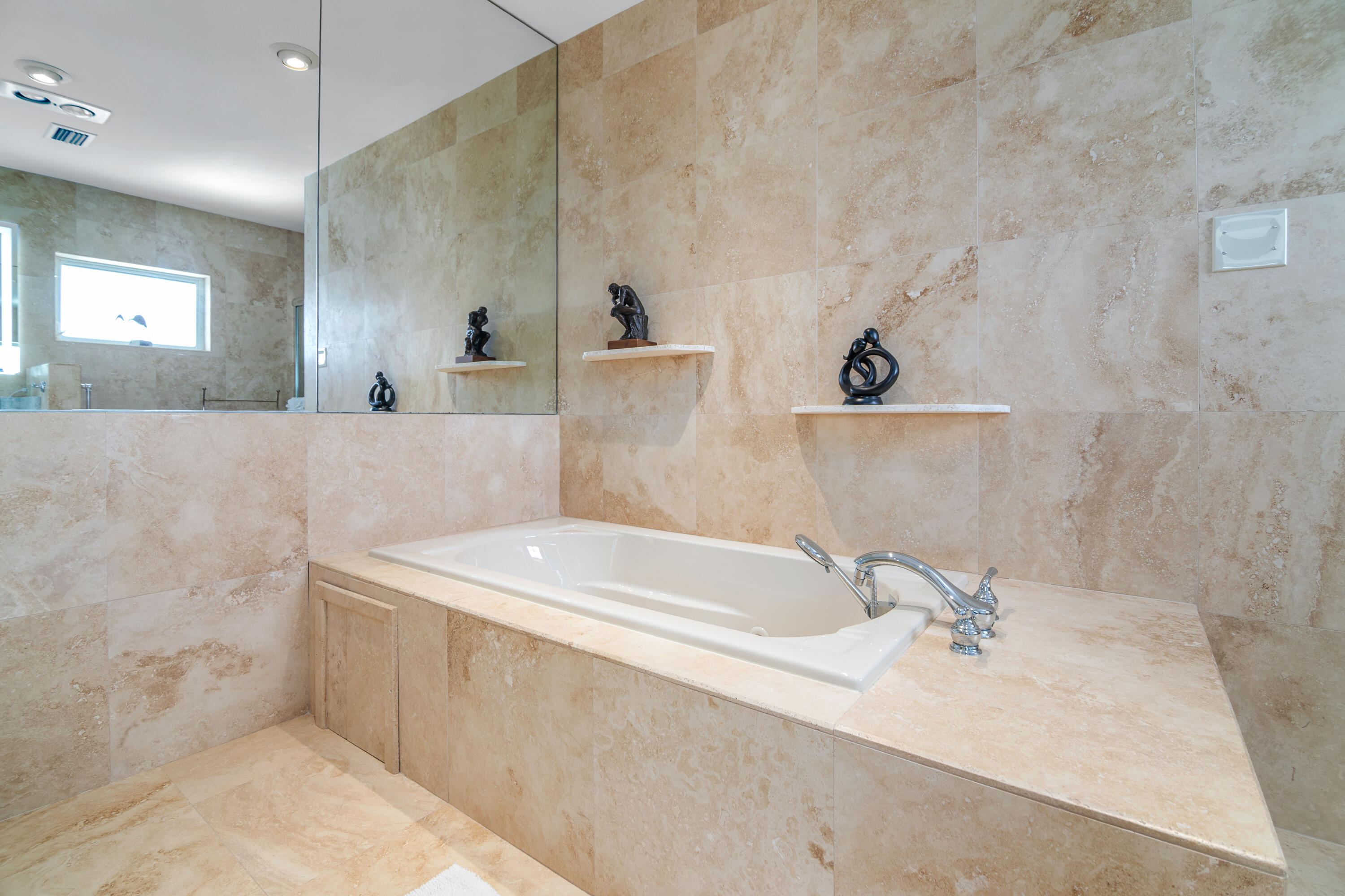 781 9th Street Key Colony Beach, FL 33051 - Photo 33 of 95 a bathroom with a bathtub and a sink