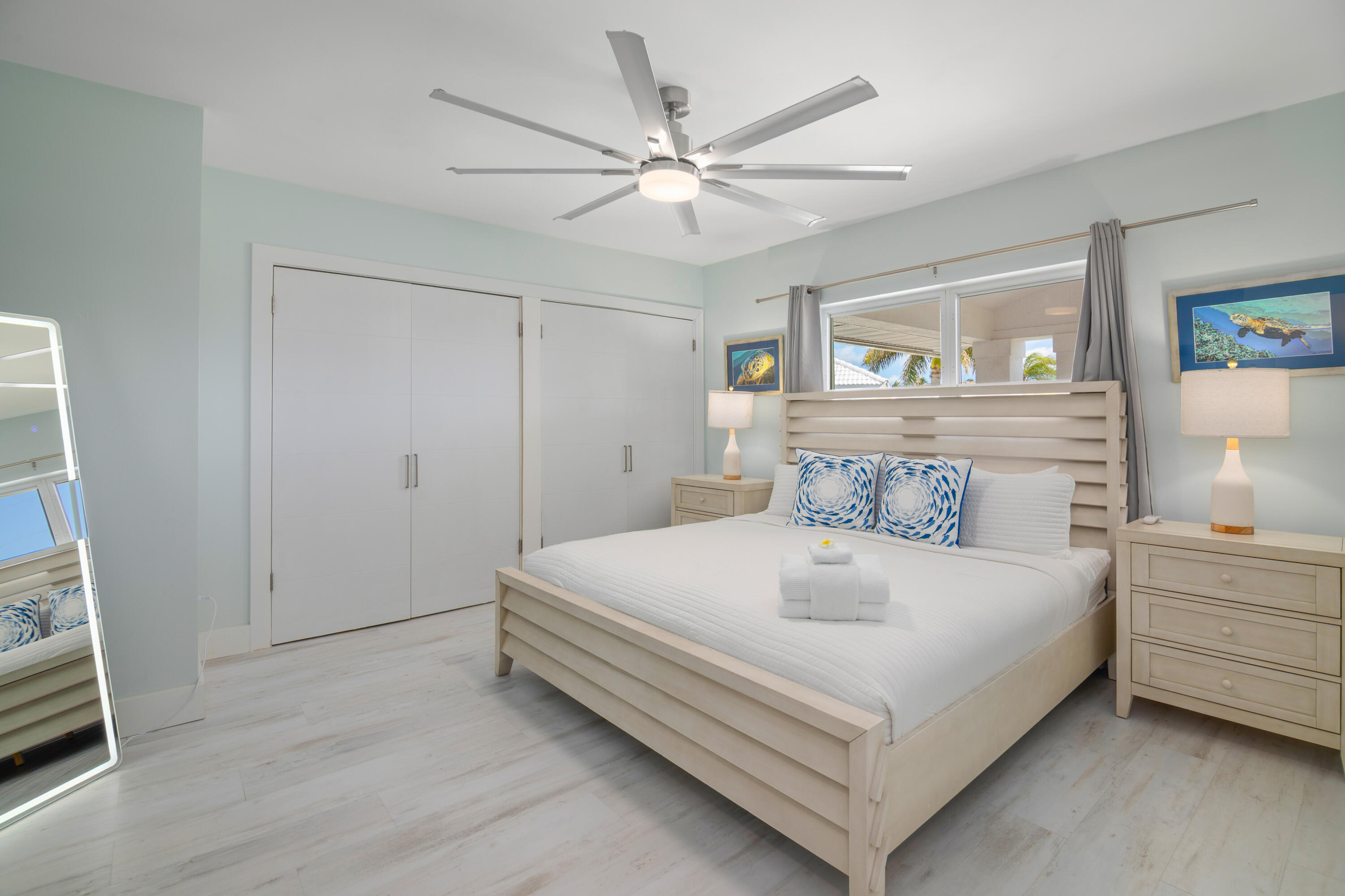 781 9th Street Key Colony Beach, FL 33051 - Photo 36 of 95 a bed room with a bed and a ceiling fan
