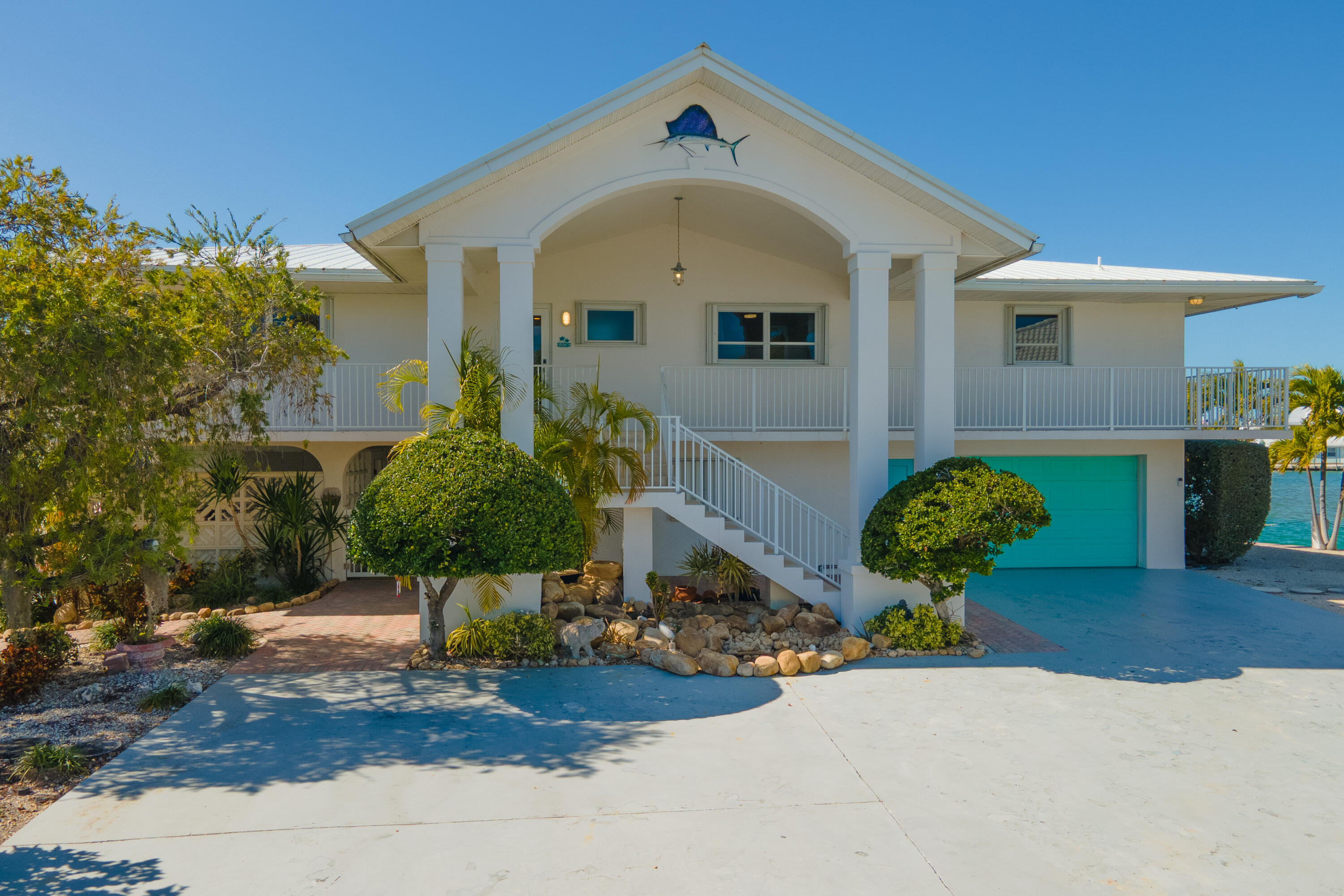 781 9th Street Key Colony Beach, FL 33051 - Photo 4 of 95 a front view of a house