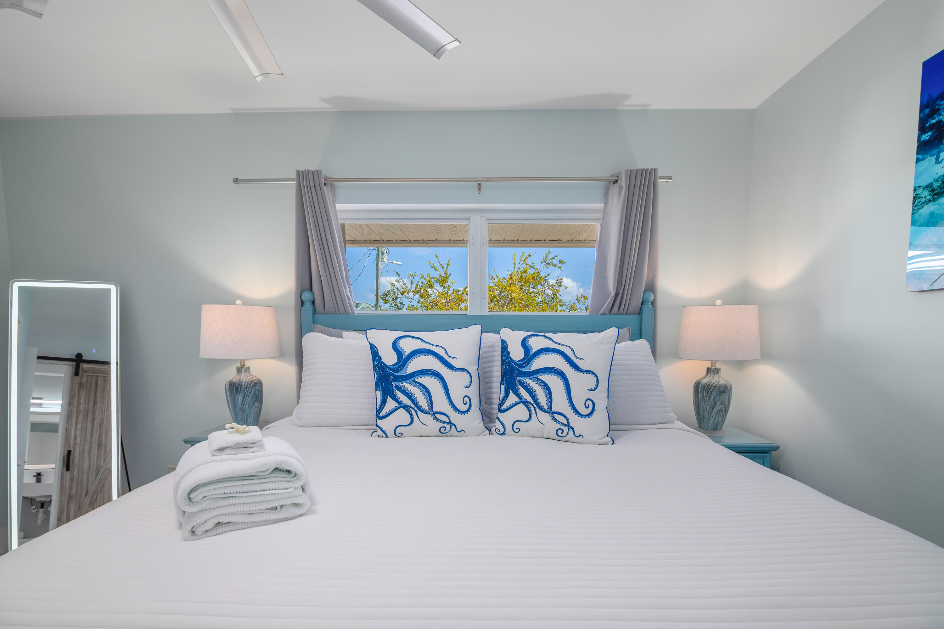 781 9th Street Key Colony Beach, FL 33051 - Photo 42 of 95 a bedroom with a bed and a window