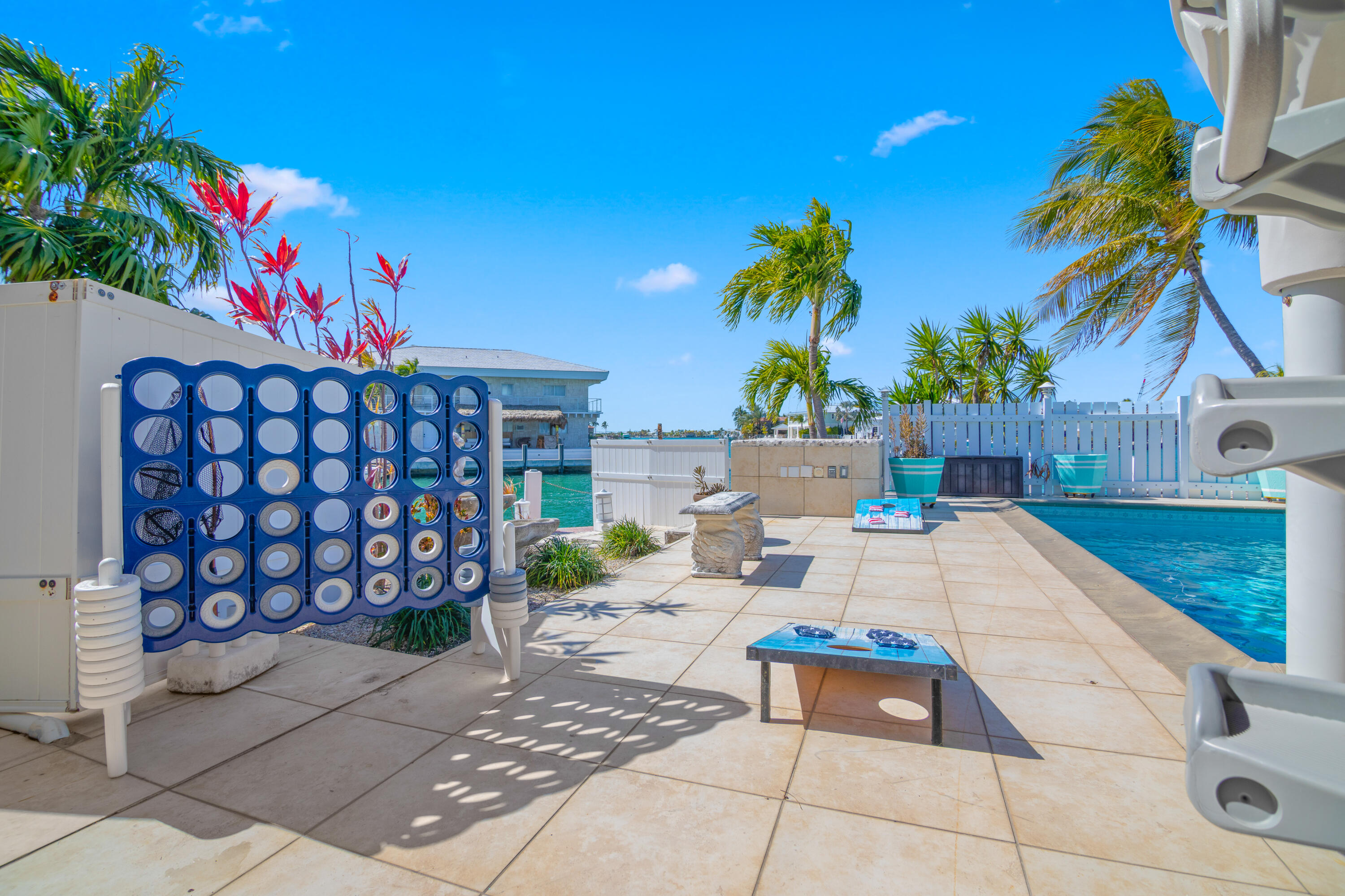 781 9th Street Key Colony Beach, FL 33051 - Photo 61 of 95 a view of a backyard with plants