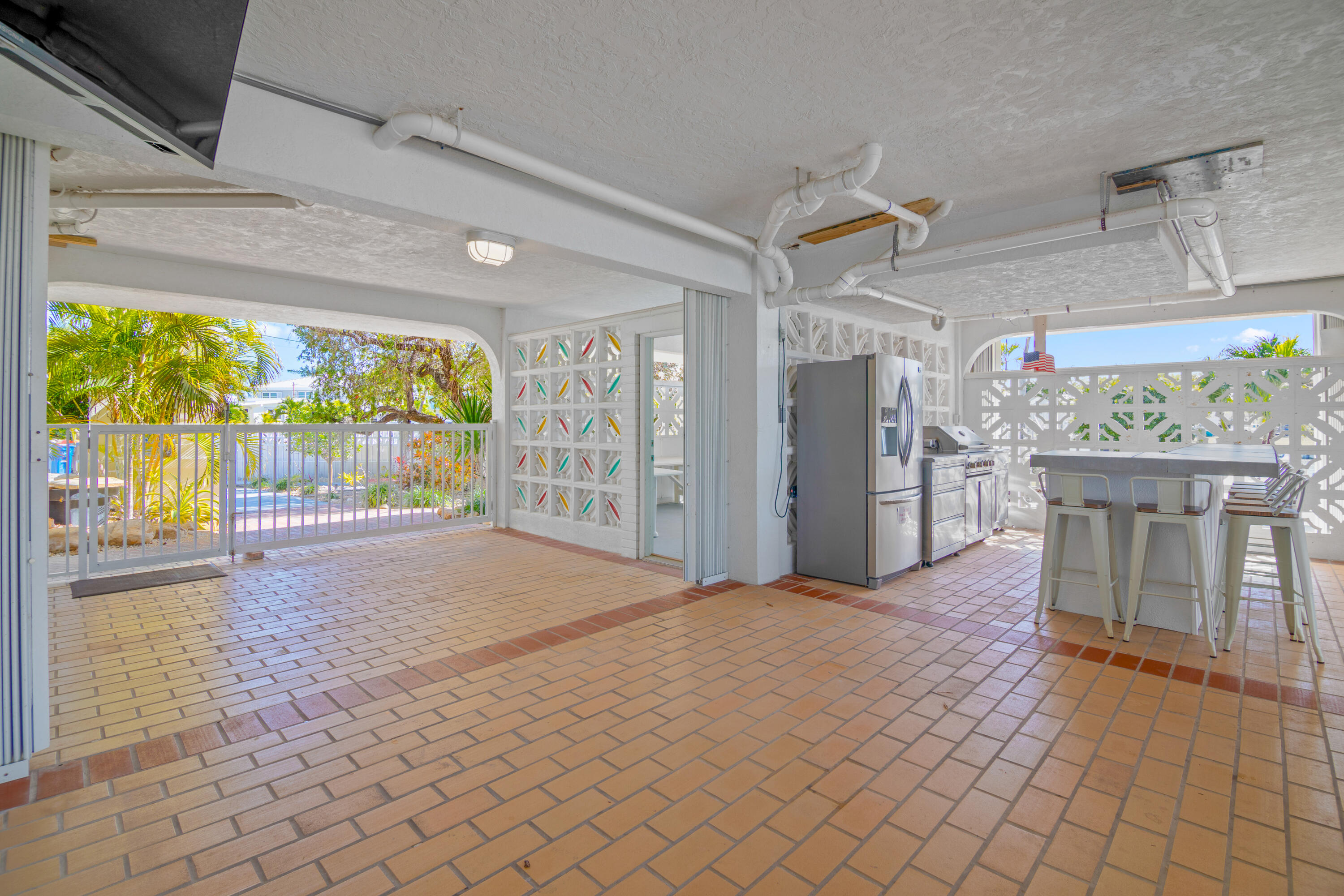 781 9th Street Key Colony Beach, FL 33051 - Photo 66 of 95 a view of livingroom with furniture and a floor to ceiling window