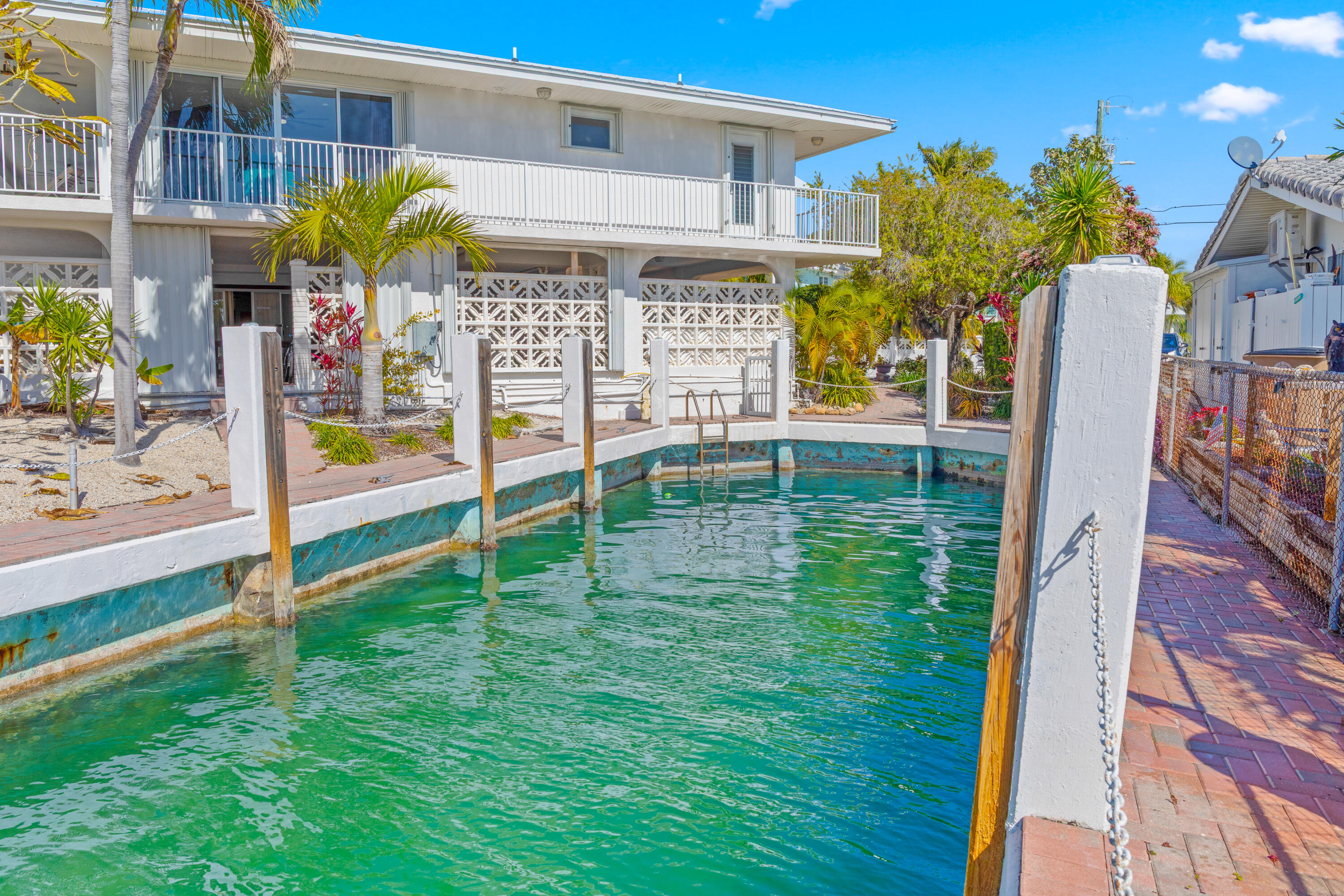 781 9th Street Key Colony Beach, FL 33051 - Photo 84 of 95 a view of a house with a yard