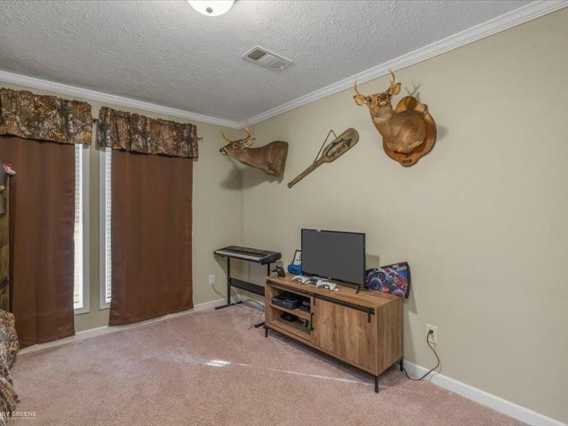 128 Gas Plant Road Doyline, LA 71023 - Photo 16 of 39 a living room with furniture and a window