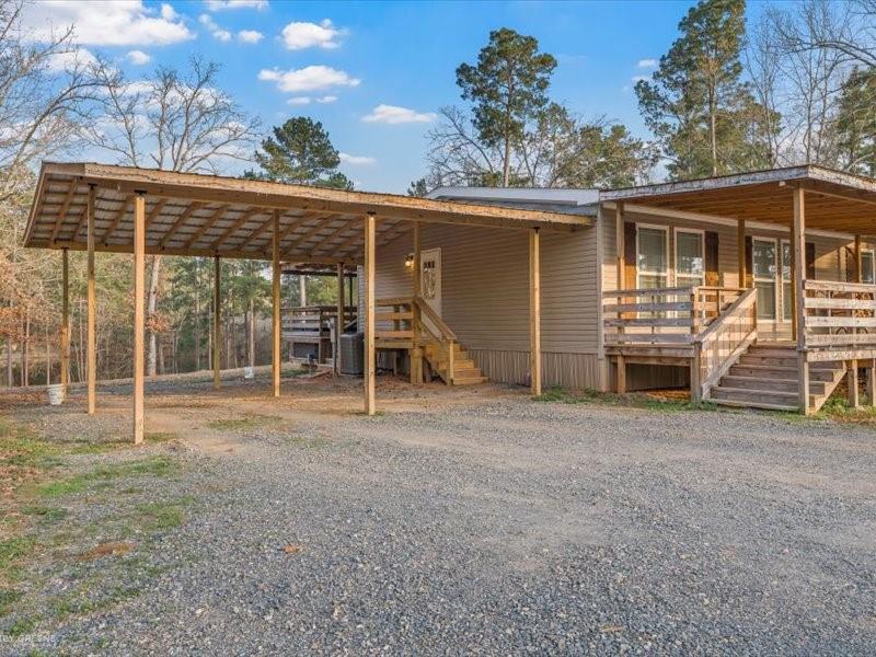 128 Gas Plant Road Doyline, LA 71023 - Photo 28 of 39 a view of a house with backyard