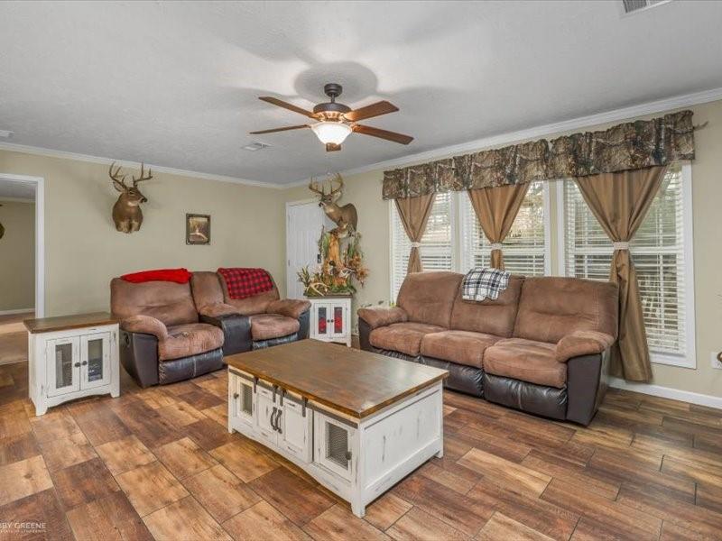 128 Gas Plant Road Doyline, LA 71023 - Photo 3 of 39 a living room with furniture and a large window