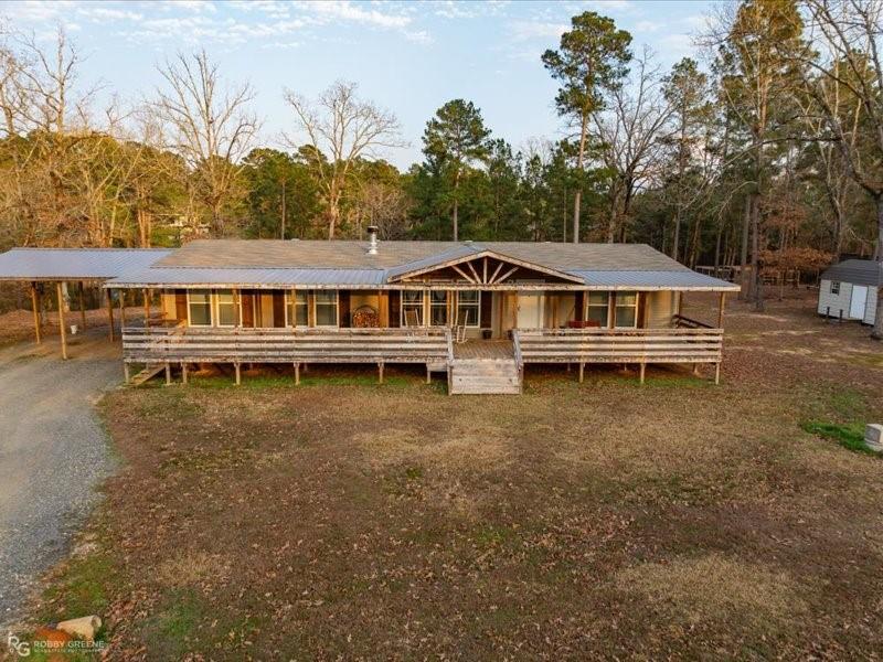 128 Gas Plant Road Doyline, LA 71023 - Photo 37 of 39 a view of a house with a yard