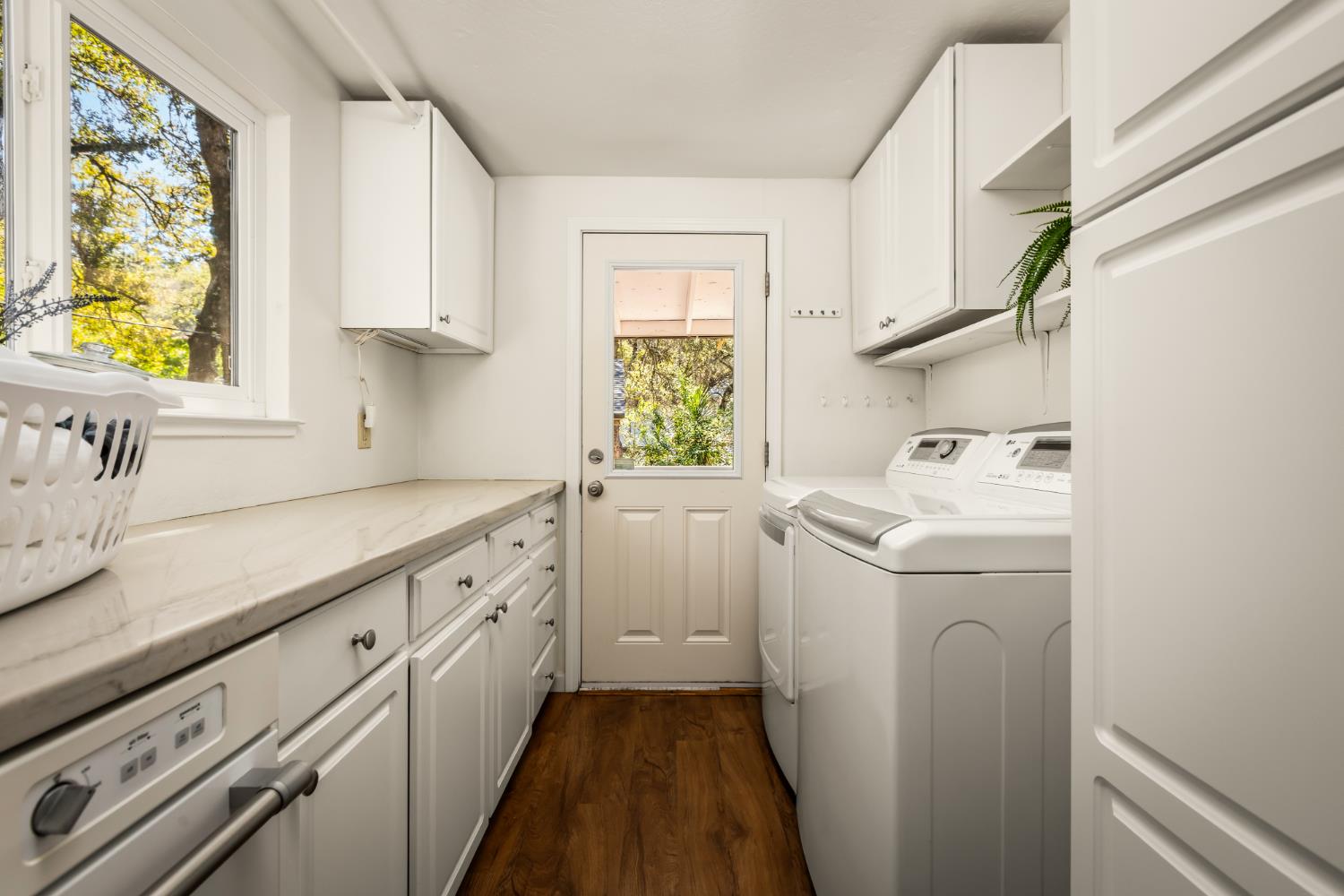 10875 Spenceville Road Penn Valley, CA 95946 - Photo 22 of 49 a view of a kitchen with window and washer