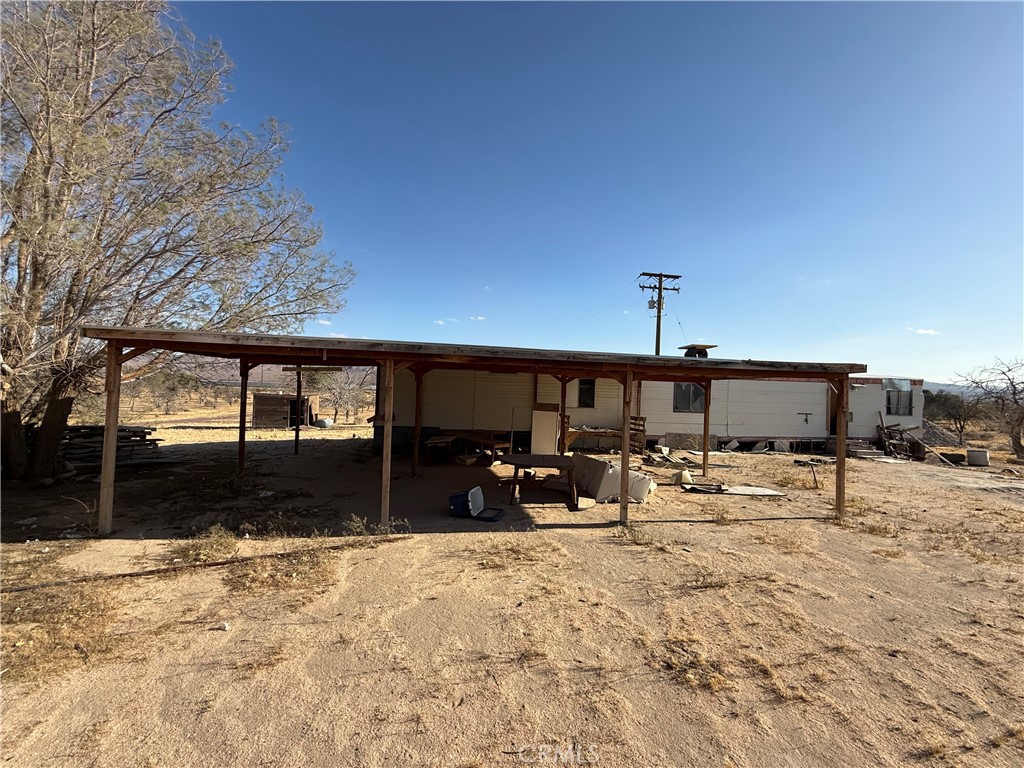 41854 Silver Valley Road Newberry Springs, CA 92365 - Photo 11 of 18 a view of a house with snow on the road