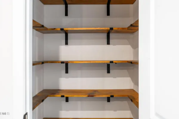 a kitchen with granite countertop a stove and a sink