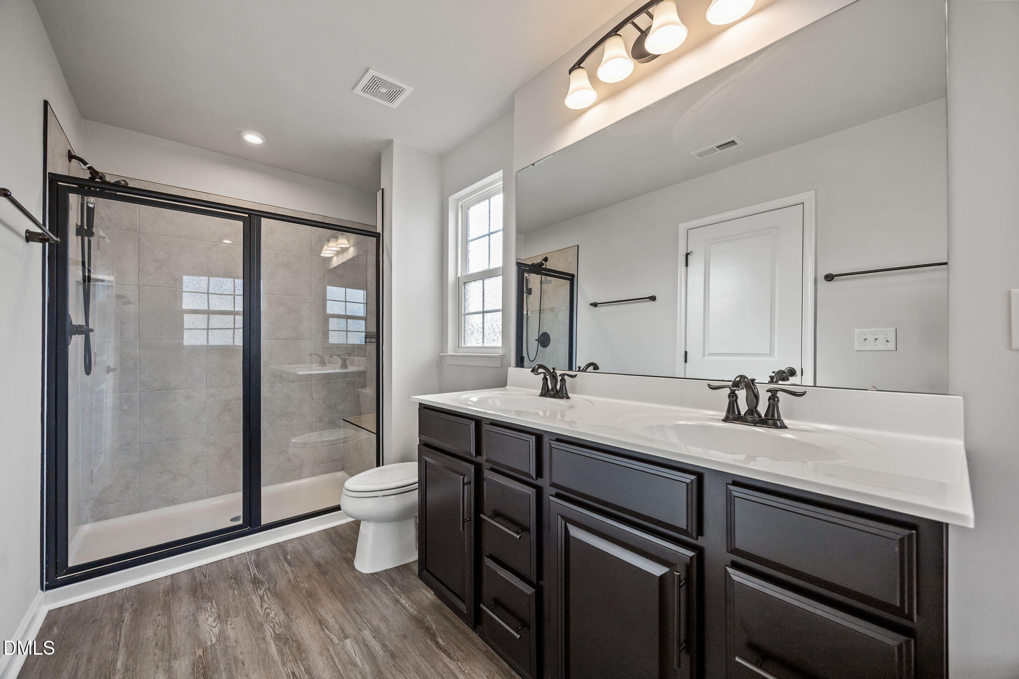 325 Amber Acorn Avenue Raleigh, NC 27603 - Photo 23 of 46 Primary Bathroom with Double Vanity