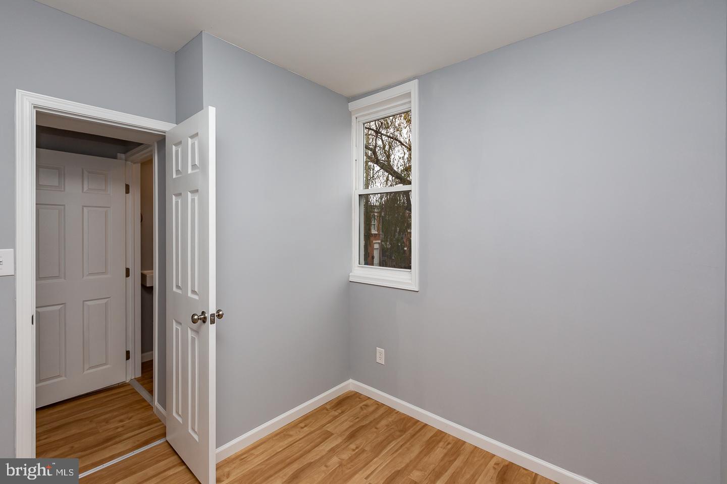 2735 Waterloo Street Philadelphia, PA 19133 - Photo 14 of 25 a view of a room with wooden floor and a bathroom