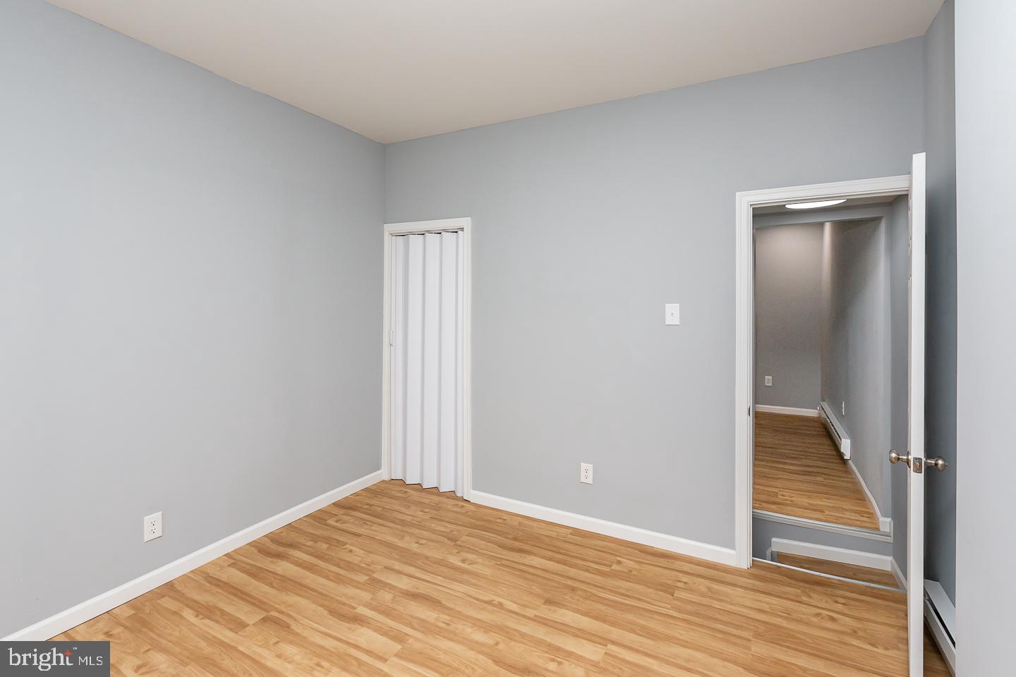2735 Waterloo Street Philadelphia, PA 19133 - Photo 15 of 25 a view of a room with wooden floor and staircase