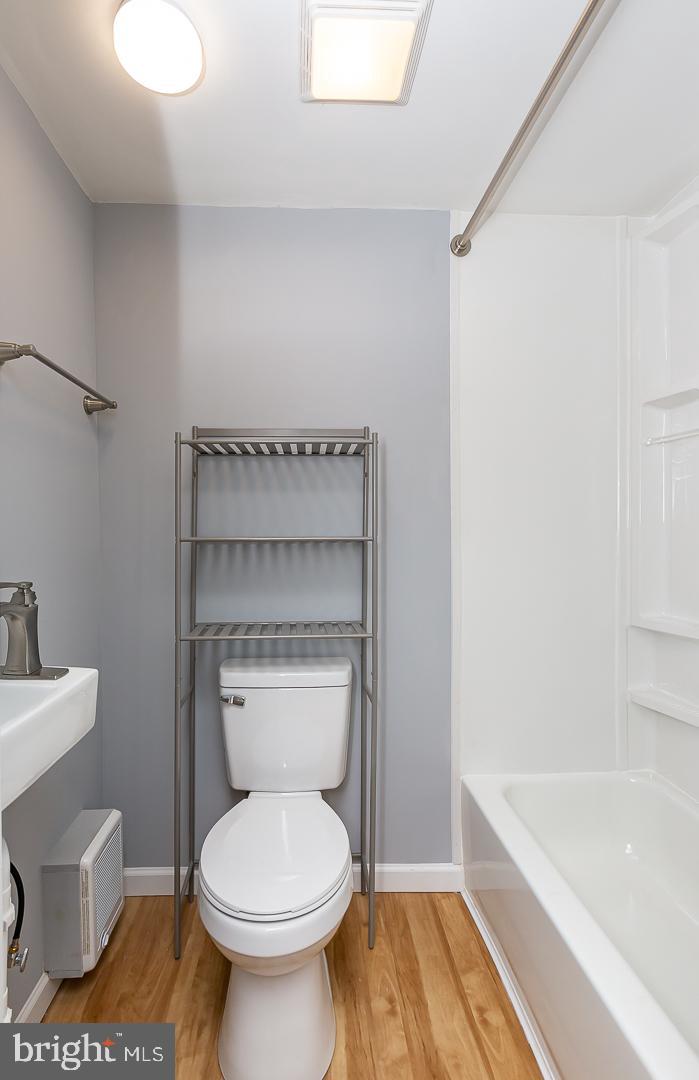 2735 Waterloo Street Philadelphia, PA 19133 - Photo 21 of 25 a bathroom with a toilet and a bathtub
