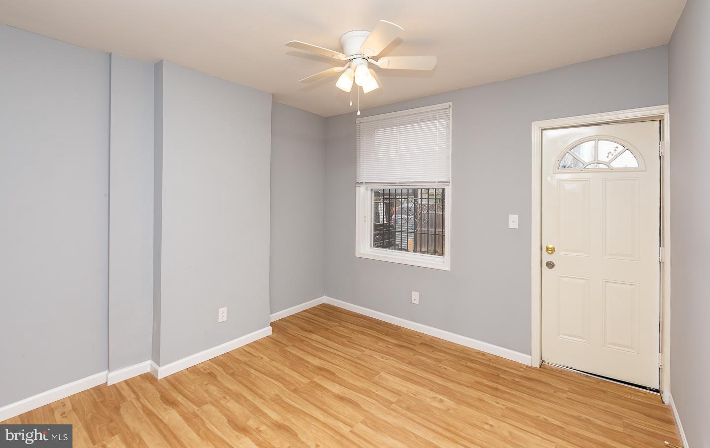 2735 Waterloo Street Philadelphia, PA 19133 - Photo 4 of 25 a view of a room with a ceiling fan and wooden floor