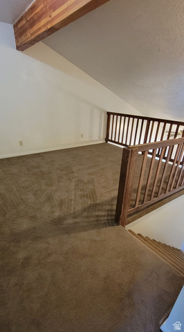190 West 700 North Logan, UT 84321 - Photo 50 of 51 Stairway featuring a textured ceiling and carpet floors