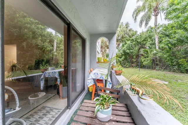 a view of swimming pool with a patio