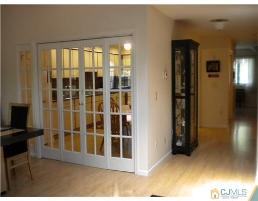 123 Redpine Loop Old Bridge, NJ 08857 - Photo 21 of 24 a view of an entryway with wooden floor