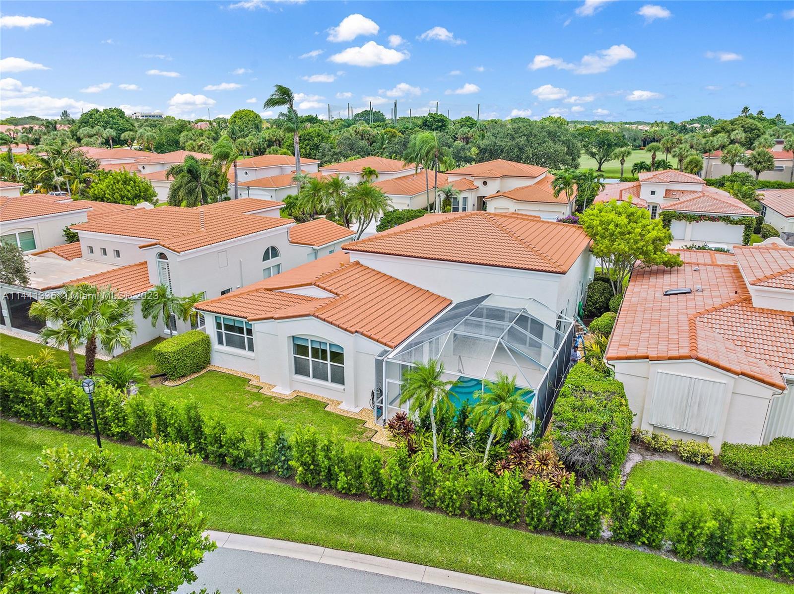 3670 Northwind Court Jupiter, FL 33477 - Photo 34 of 45 an aerial view of a house with yard and lake view