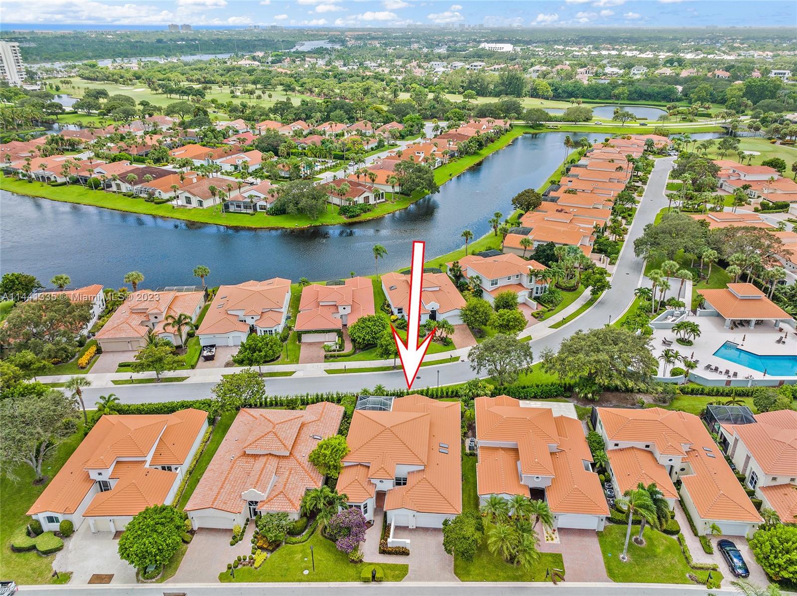 3670 Northwind Court Jupiter, FL 33477 - Photo 39 of 45 an aerial view of residential houses with outdoor space and river