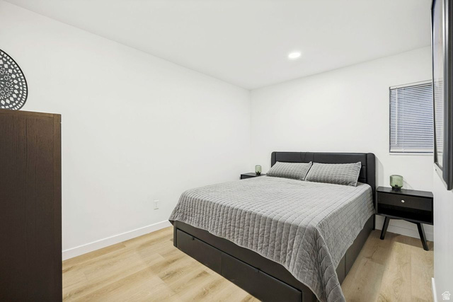 1723 Albury Road Sandy, UT 84092 - Photo 20 of 23 Bedroom featuring wood-finish flooring, recessed lighting, and a window with horizontal blinds