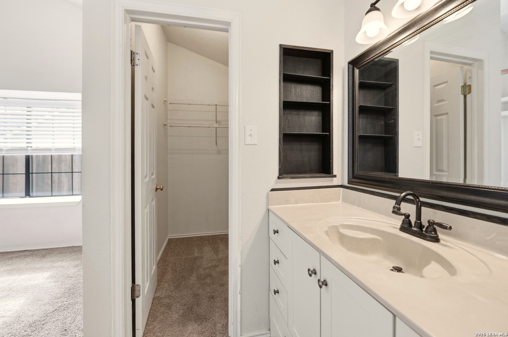 3425 Country View Cibolo, TX 78108 - Photo 19 of 39 a bathroom with a sink and a mirror