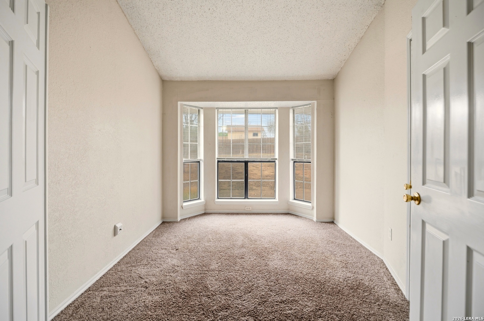 3425 Country View Cibolo, TX 78108 - Photo 20 of 39 a view of a room with a large window and front door