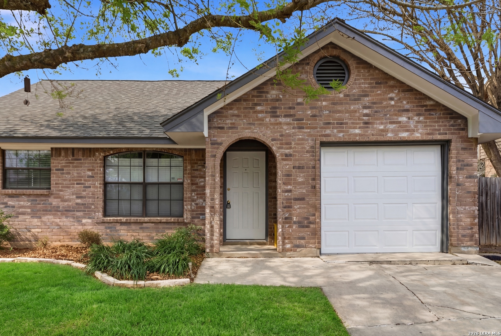 3425 Country View Cibolo, TX 78108 - Photo 2 of 39 a front view of a house with a garden and garage
