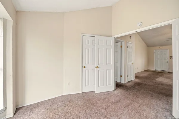 a view of a room with an empty space