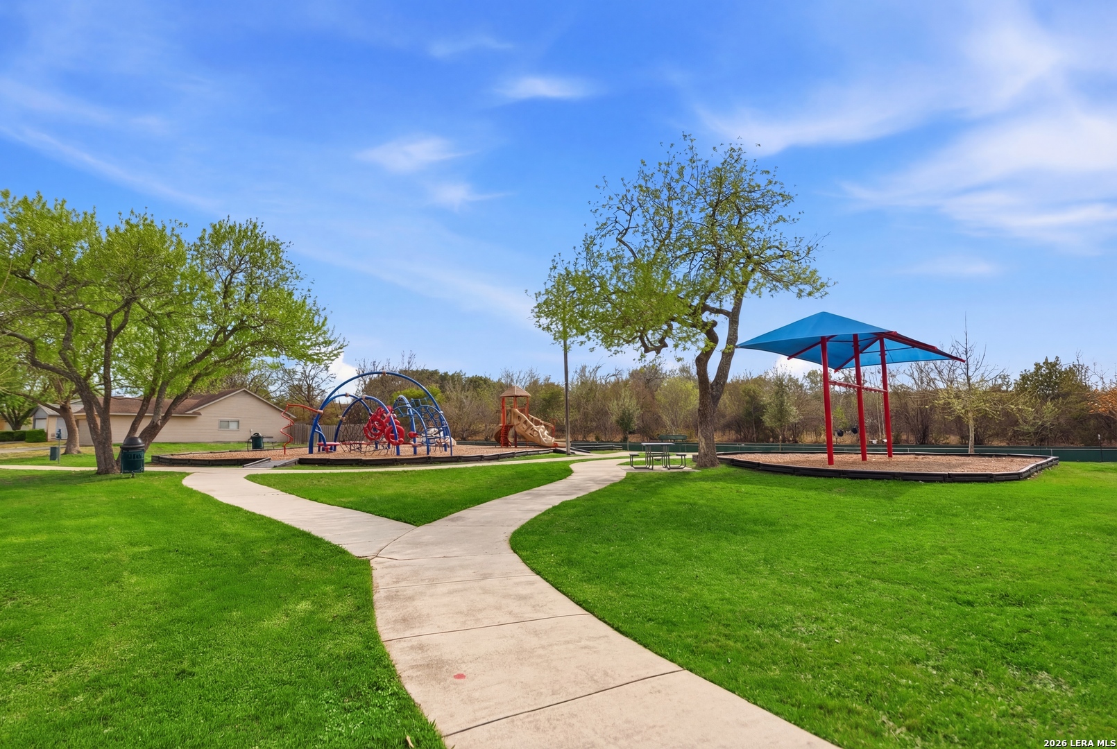 3425 Country View Cibolo, TX 78108 - Photo 35 of 39 a view of a garden with a bench in the garden