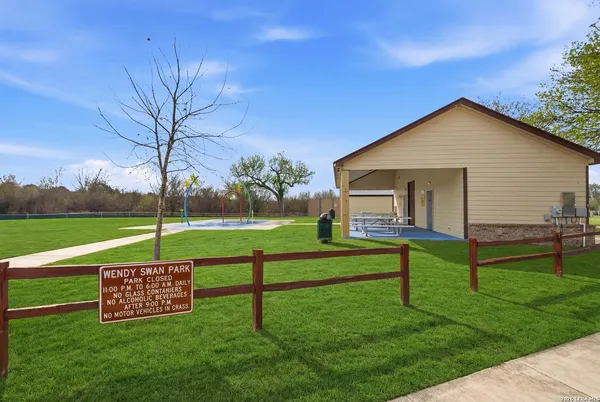 a sign board with a big yard