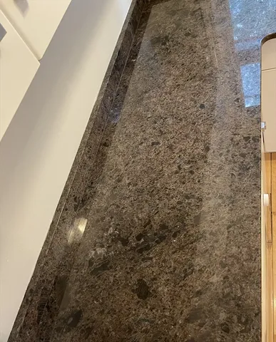 a view of small space with wooden floor