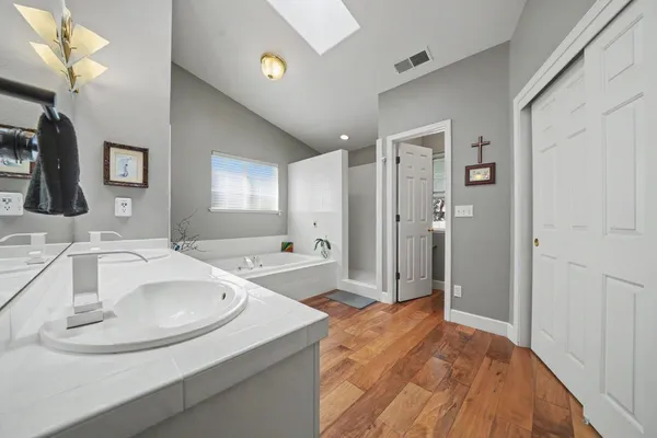 a view of backyard with hardwood and deck