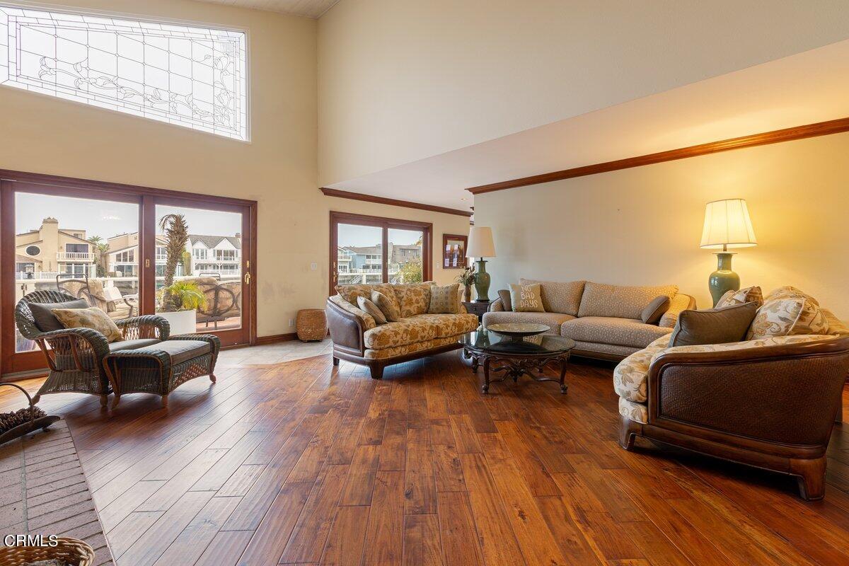 2131 Ravoli Drive Oxnard, CA 93035 - Photo 11 of 43 a living room with furniture and a wooden floor