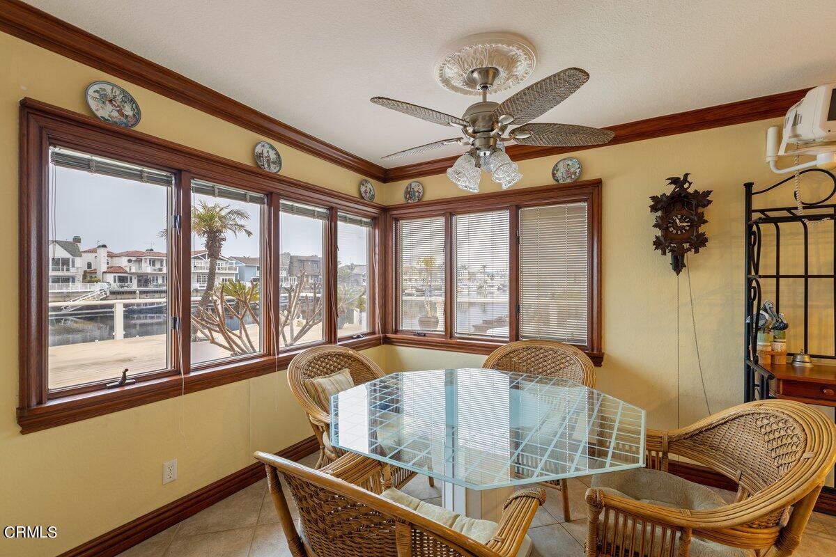 2131 Ravoli Drive Oxnard, CA 93035 - Photo 14 of 43 a living room with furniture and a large window