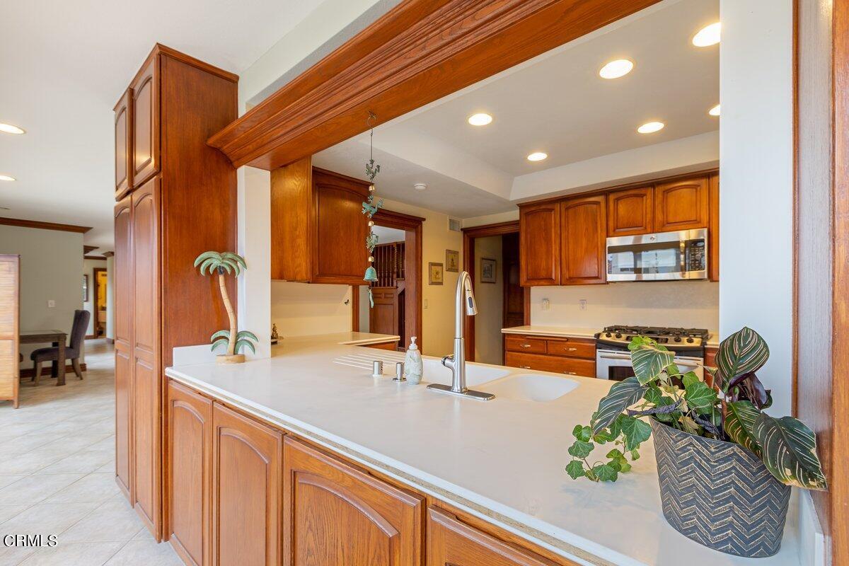 2131 Ravoli Drive Oxnard, CA 93035 - Photo 17 of 43 a bathroom with sink and mirror