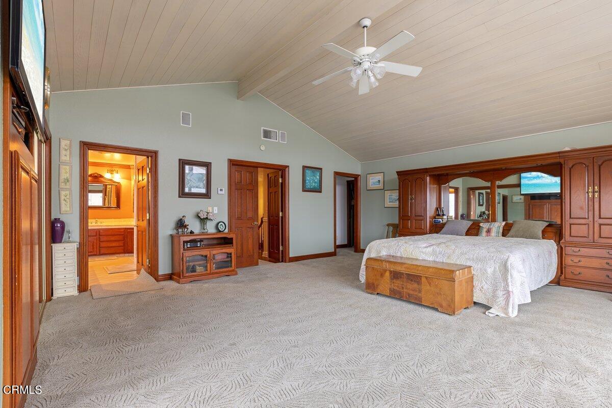 2131 Ravoli Drive Oxnard, CA 93035 - Photo 25 of 43 a living room with furniture and a chandelier