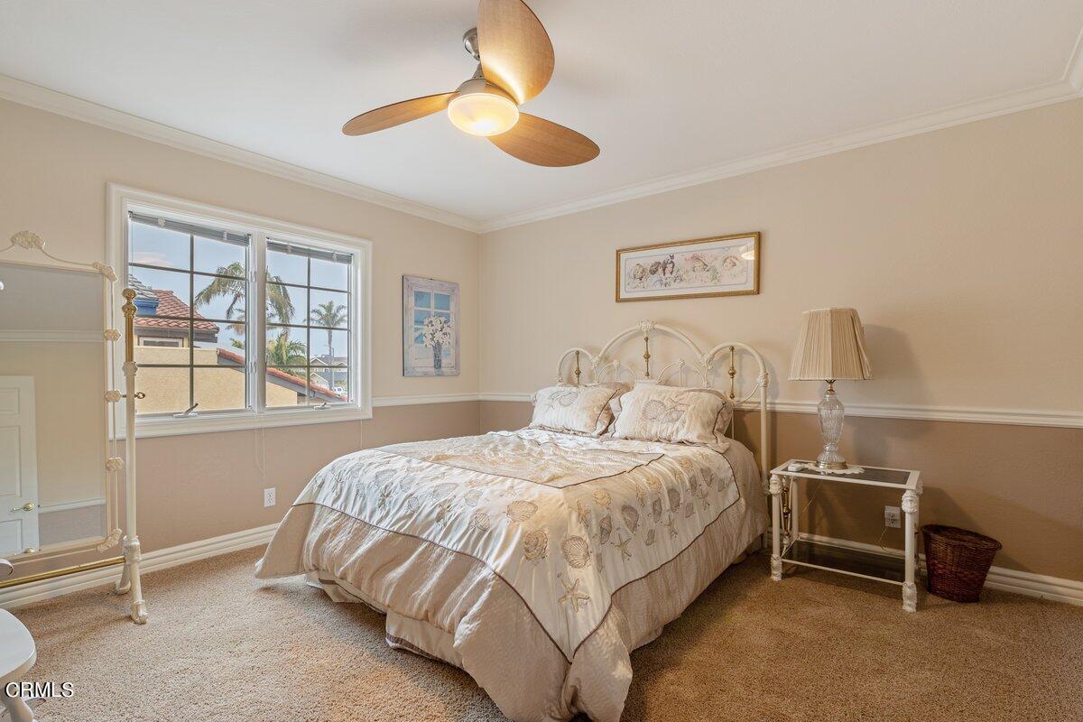 2131 Ravoli Drive Oxnard, CA 93035 - Photo 30 of 43 a bedroom with a bed and a window