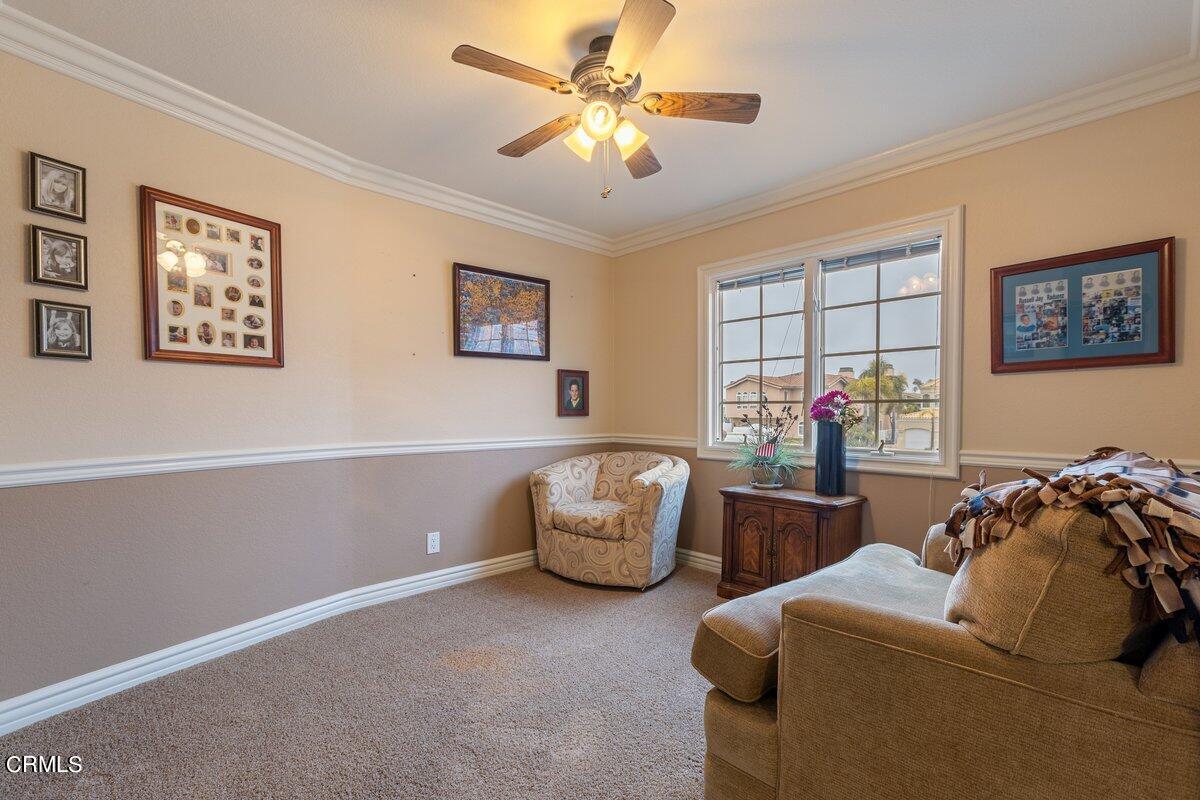 2131 Ravoli Drive Oxnard, CA 93035 - Photo 34 of 43 a living room with furniture and a window