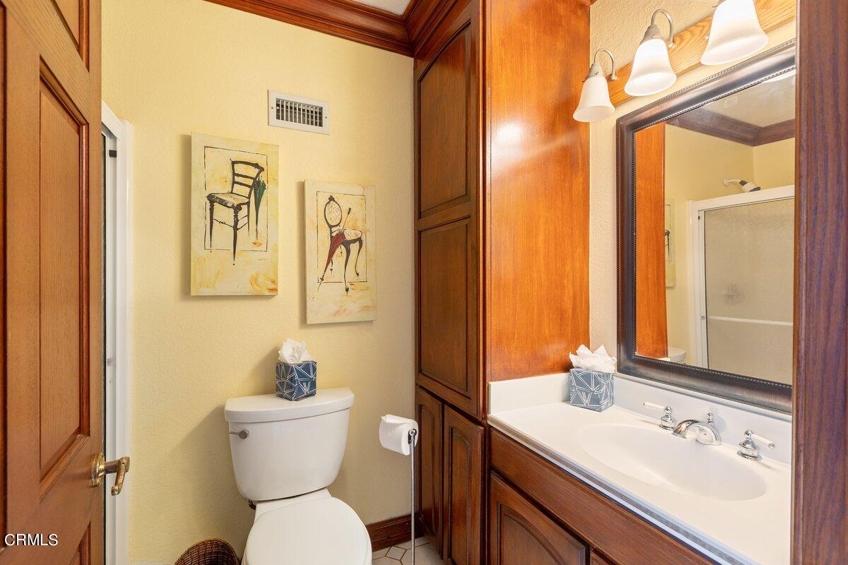 2131 Ravoli Drive Oxnard, CA 93035 - Photo 36 of 43 a bathroom with a sink toilet and shower