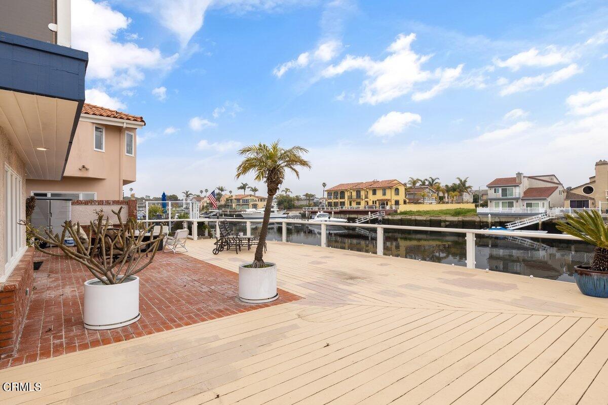 2131 Ravoli Drive Oxnard, CA 93035 - Photo 38 of 43 a swimming pool with outdoor seating and city view