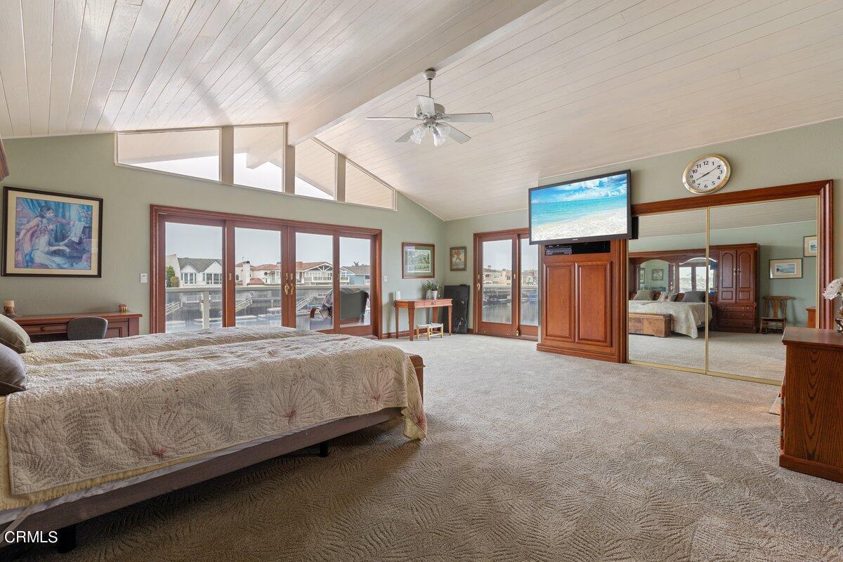 2131 Ravoli Drive Oxnard, CA 93035 - Photo 5 of 43 a bed sitting in a spacious bedroom next to a large window