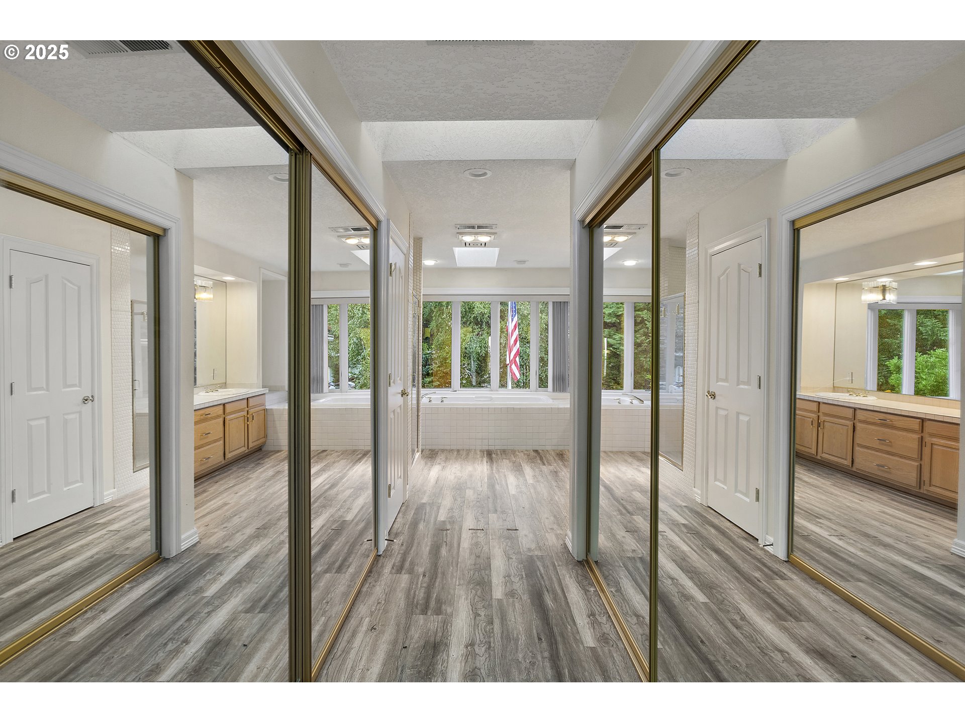 9101 Northeast Cliff Street Portland, OR 97220 - Photo 22 of 26 a view interior of a house wooden floor and windows